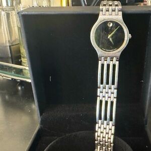 Movado woman’s classic watch some wear but in great condition ! Needs battery